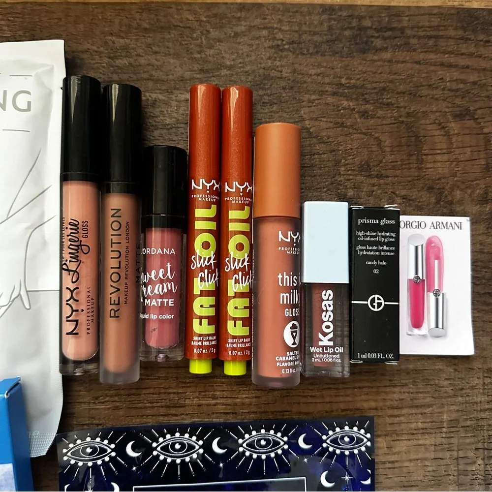 Beauty bag Lot of NYX lip glosses and more